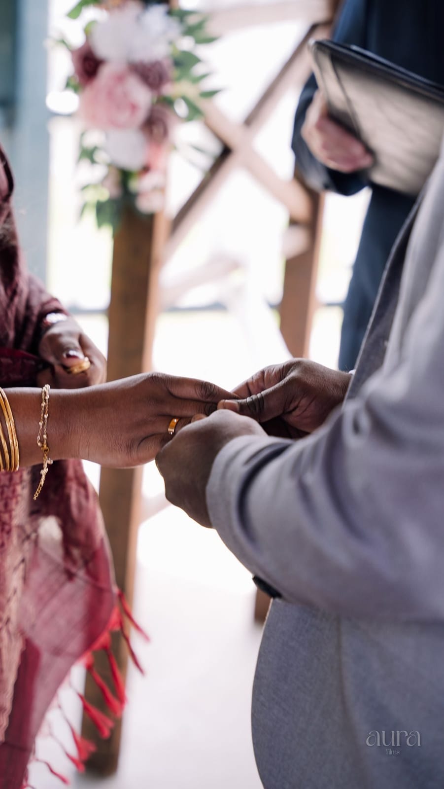 Hands meeting during the ring exchange